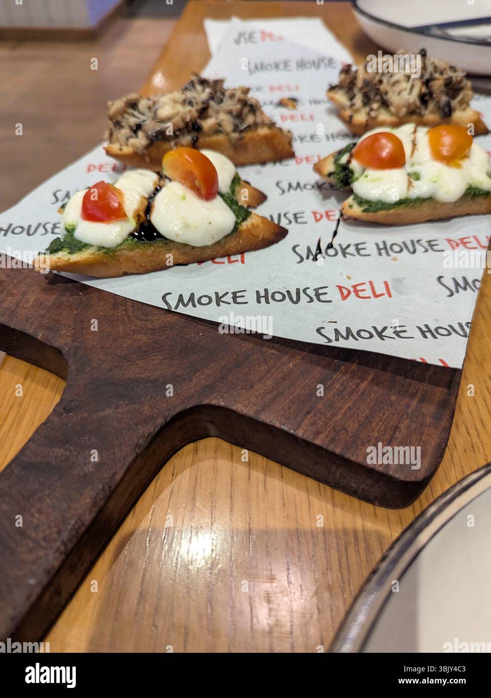 Bruschetta bliss – fresh mozzarella, cherry tomatoes, and bold flavors on perfectly toasted bread ??✨ - Smartphone Captured Stock Image