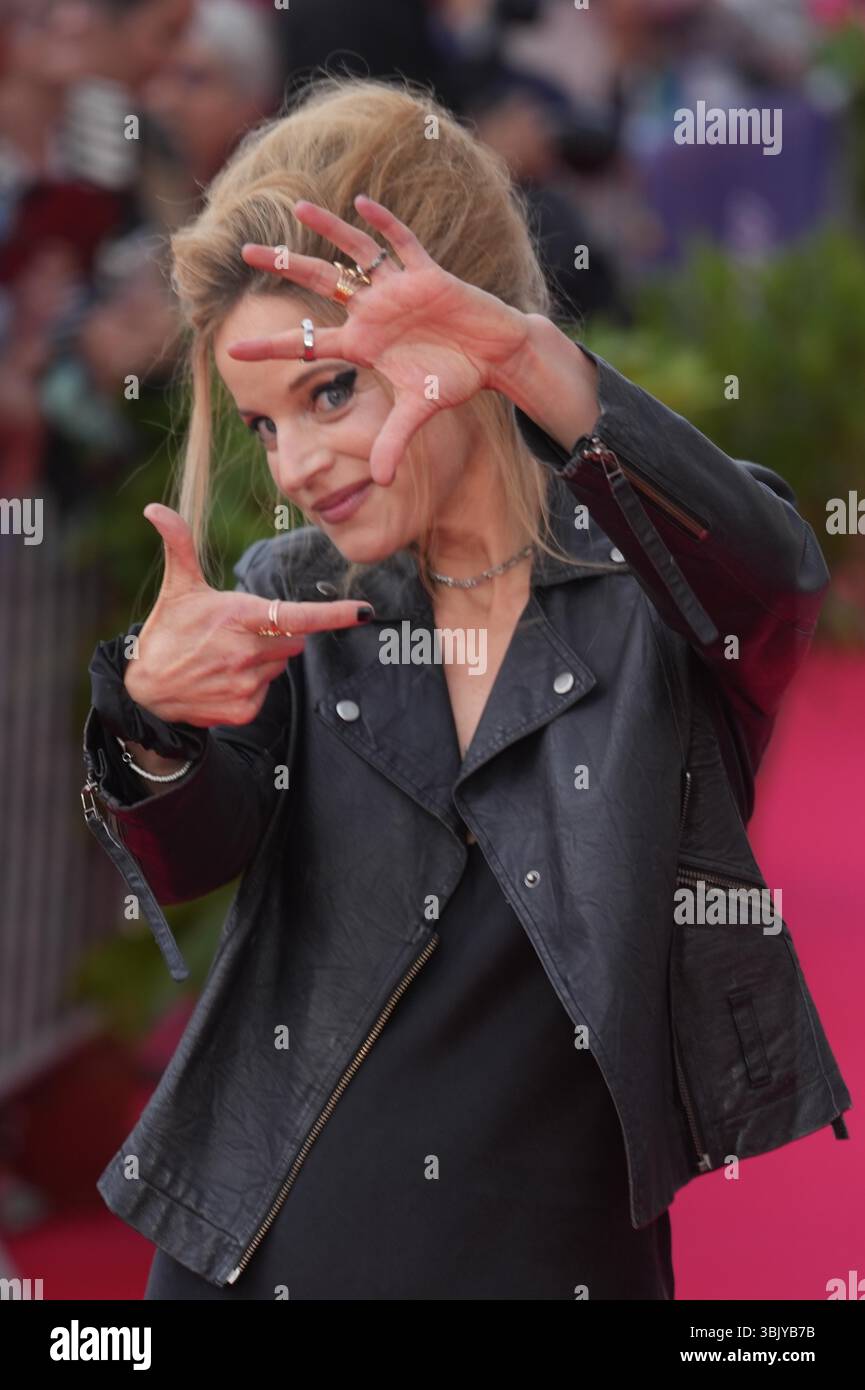 Cabourg, France. 14 juin 2025. Charlotte Colbert assiste au tapis rouge lors de la quatrime journe du 39e Festival du film de Cabourg le 14 juin 2025 ˆ Cabourg, France. le 14 juin 2025. Photo par Laurent Lairys /ABACAPRESS.COM Stock Photo
