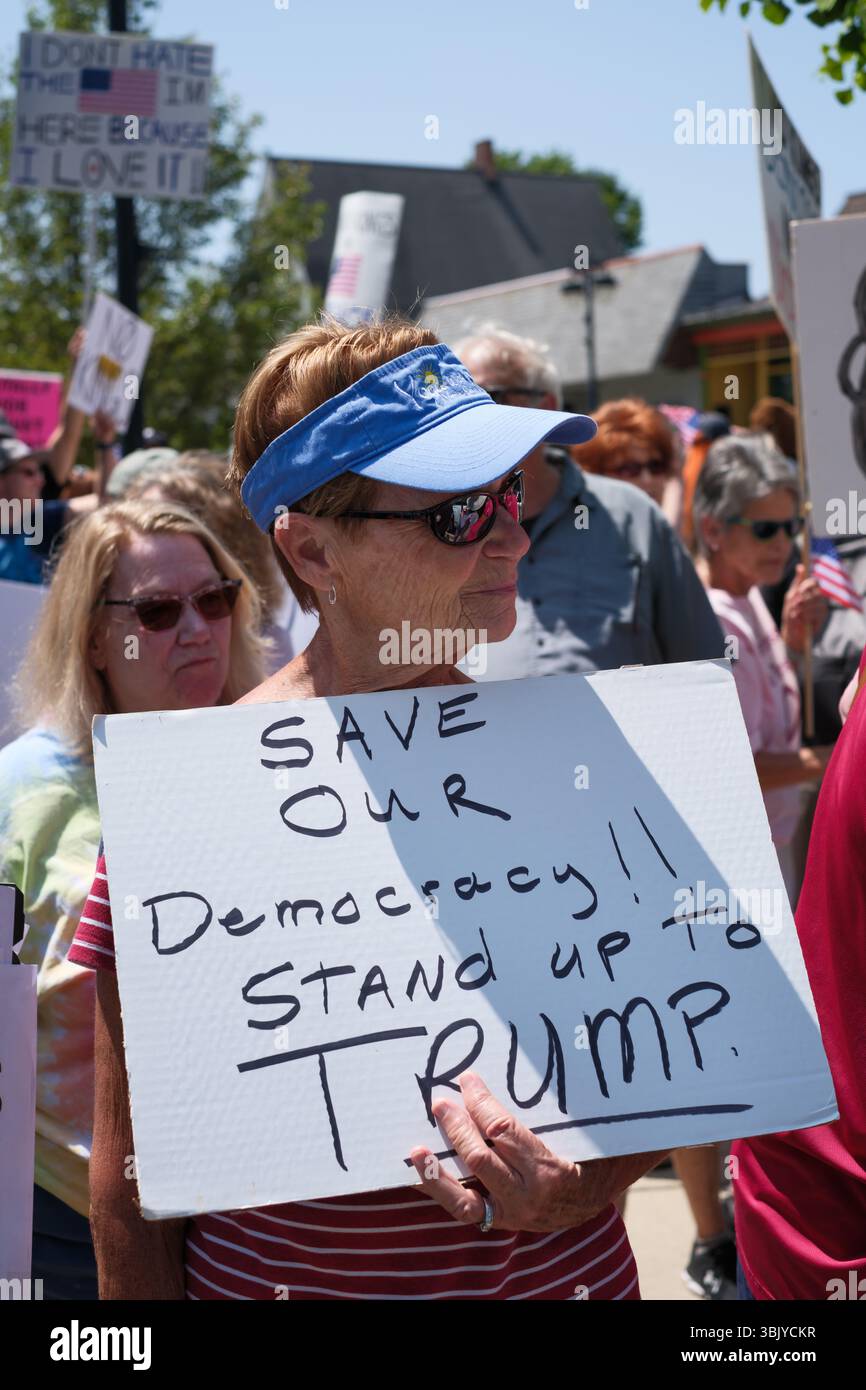 Protesters at the No Kings rally on June 14, 2025, in Fenton Michigan USA Stock Photo