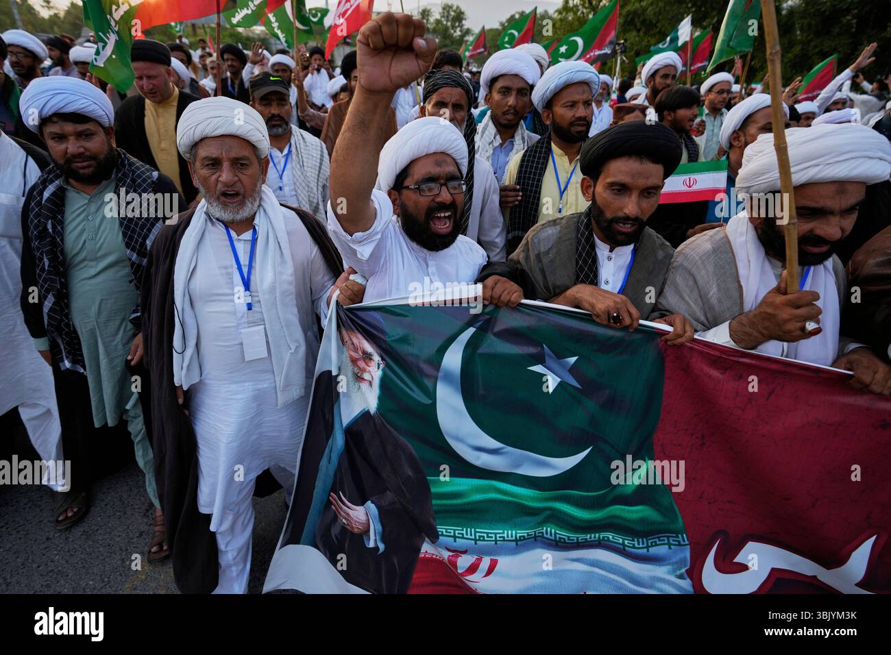 Shiite Muslims chant anti-Israel slogans during a rally to condemn ...