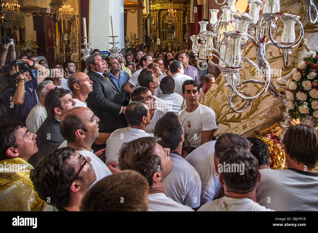 Procession Bearers Bearers and faithful in Carrión witness the emotional moment as the ...