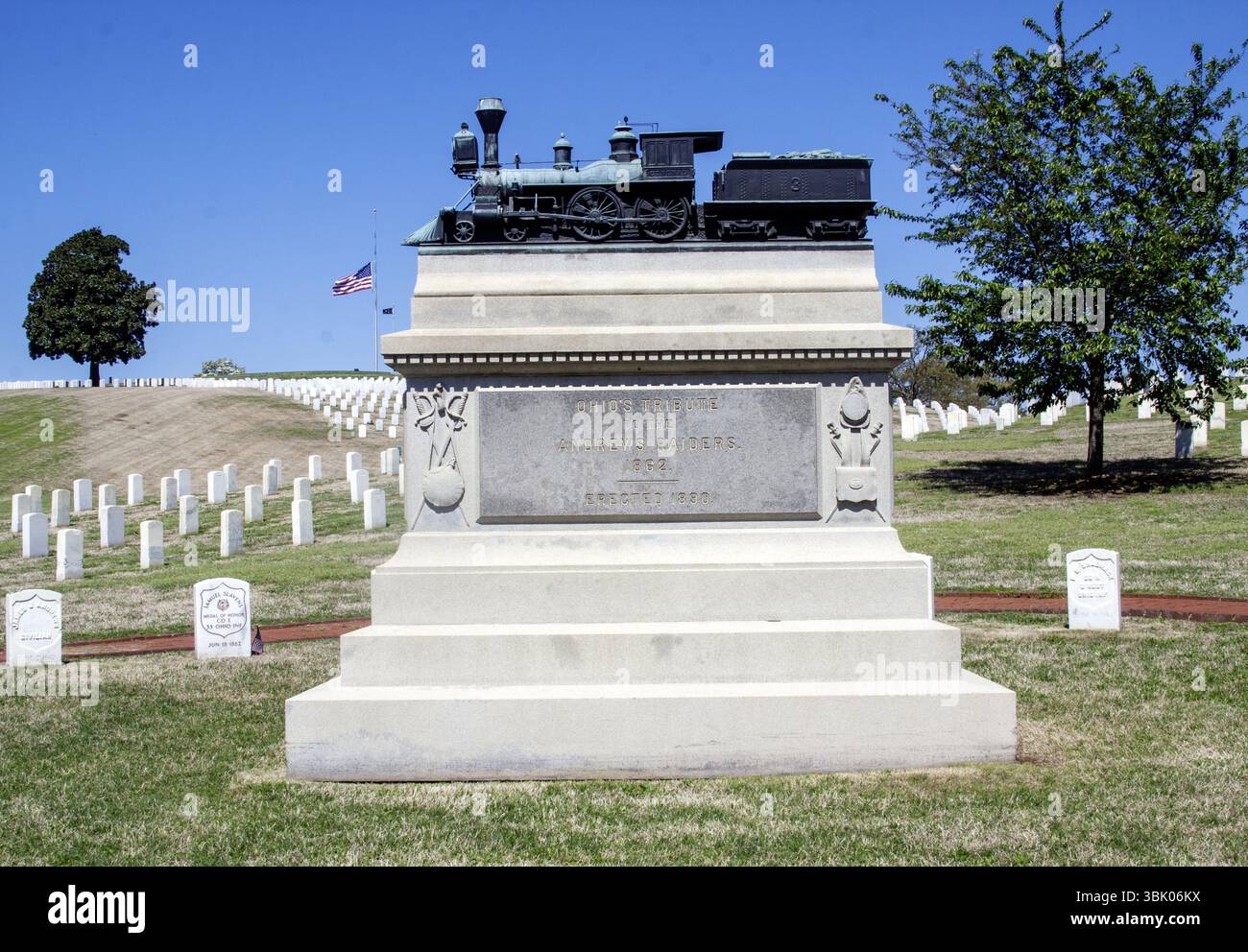 Tombstone featuring a carved train at Chattanooga National Cemetery in Chattanooga, Tennessee—honoring a railroad worker or theme. Stock Photo