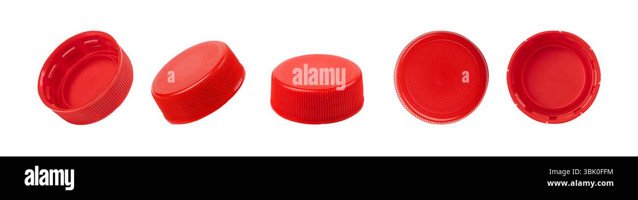 Five red plastic bottle caps shown from different angles, isolated on a white background Stock Photo