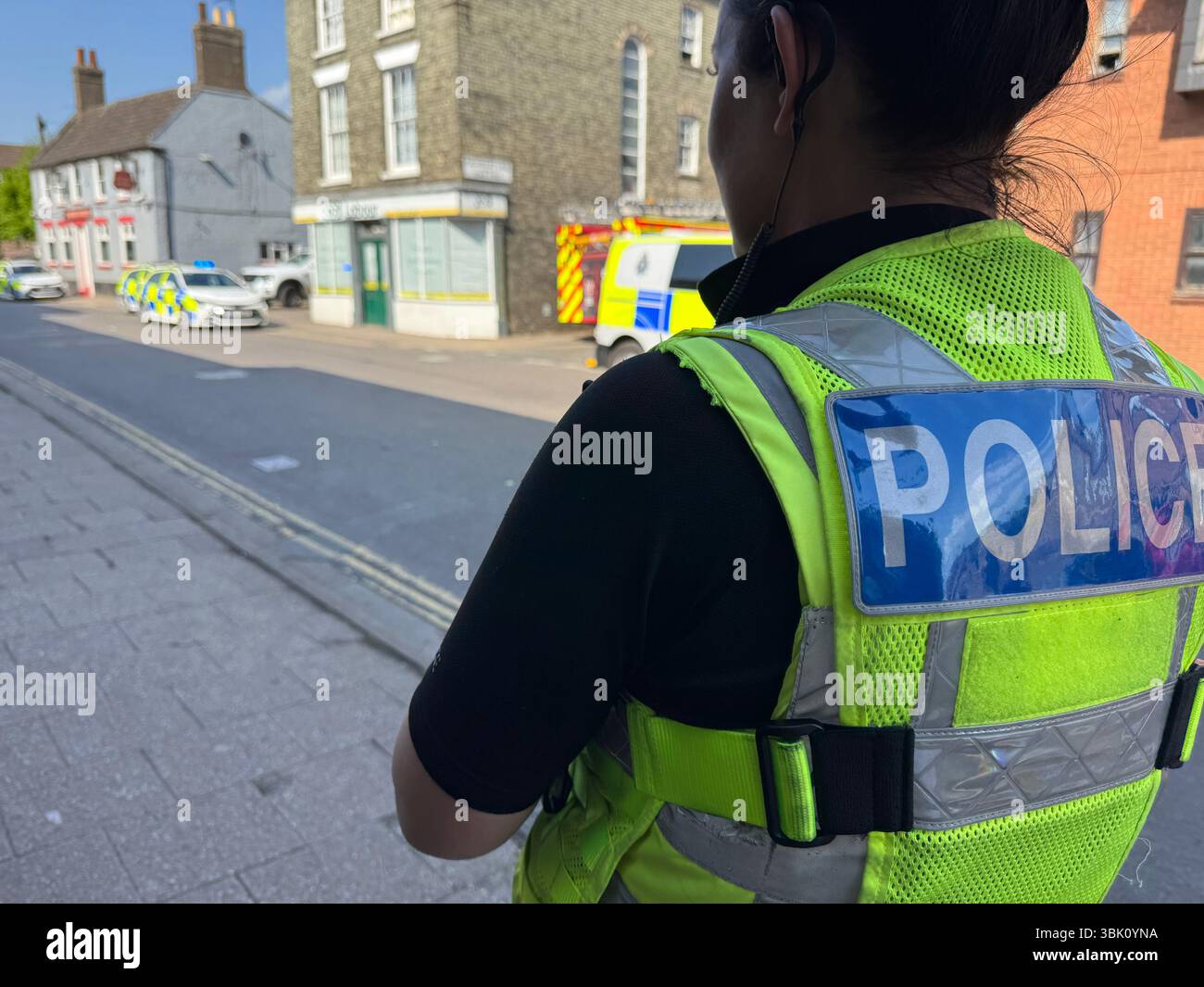 Female Police officer at an incident - Smartphone Captured Stock Image