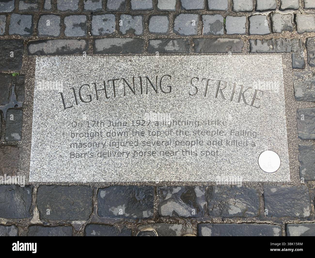 Lightning Strike on Falkirk Steeple in 1927, inscription on street, Falkirk Scotland - Smartphone Captured Stock Image
