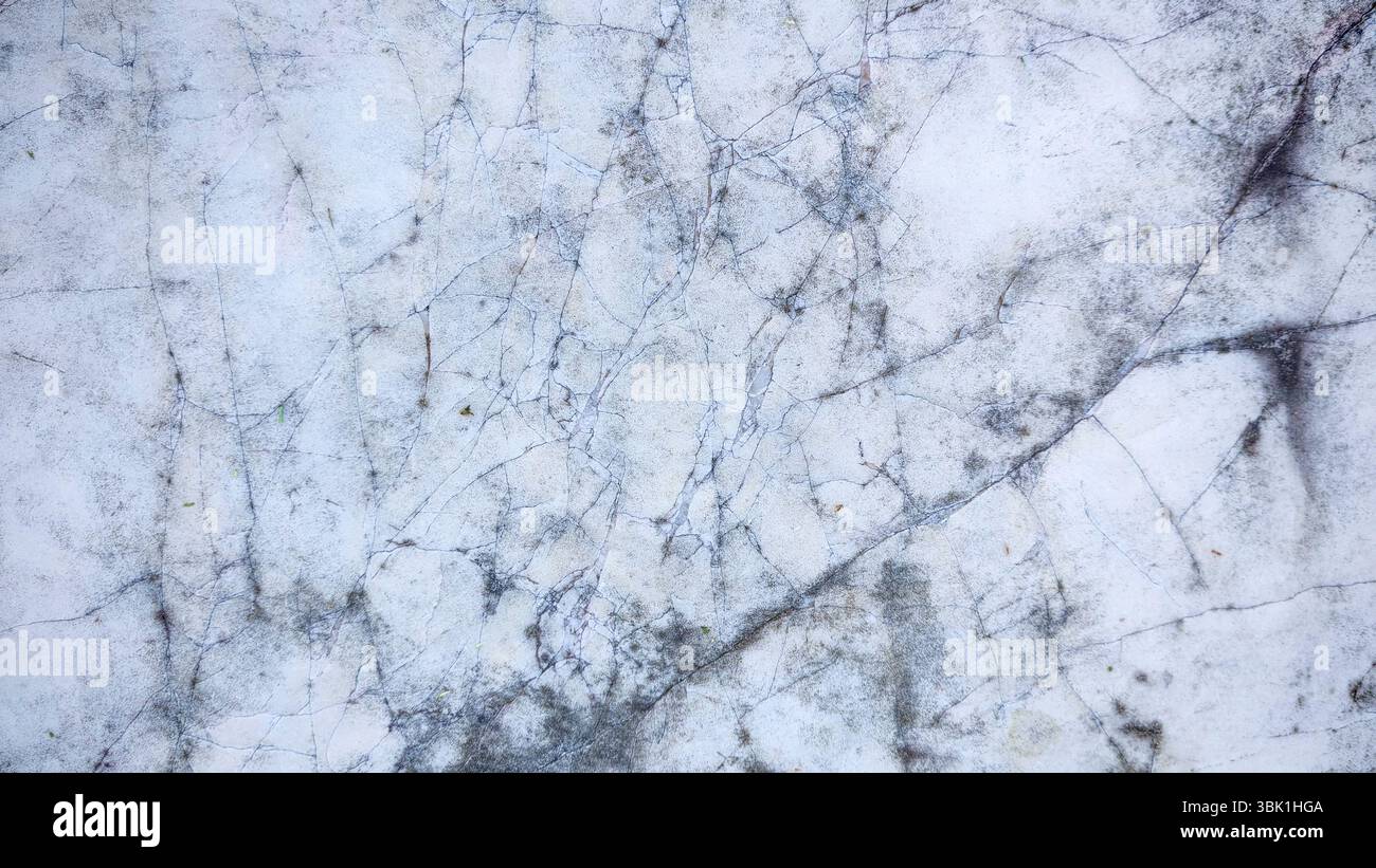Cracked White Marble Stone Texture with Dark Veins Stock Photo