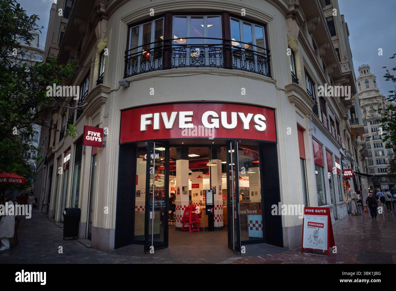 VALENCIA, SPAIN - APRIL 15, 2025: Exterior view of a Five Guys ...