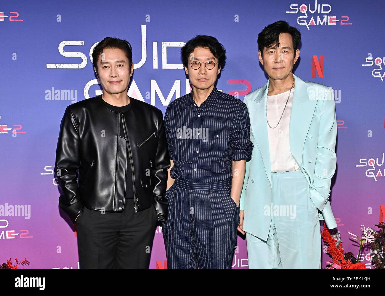 Lee Byung-hun, left, Hwang Dong-hyuk, Lee Jung-jae participate in a