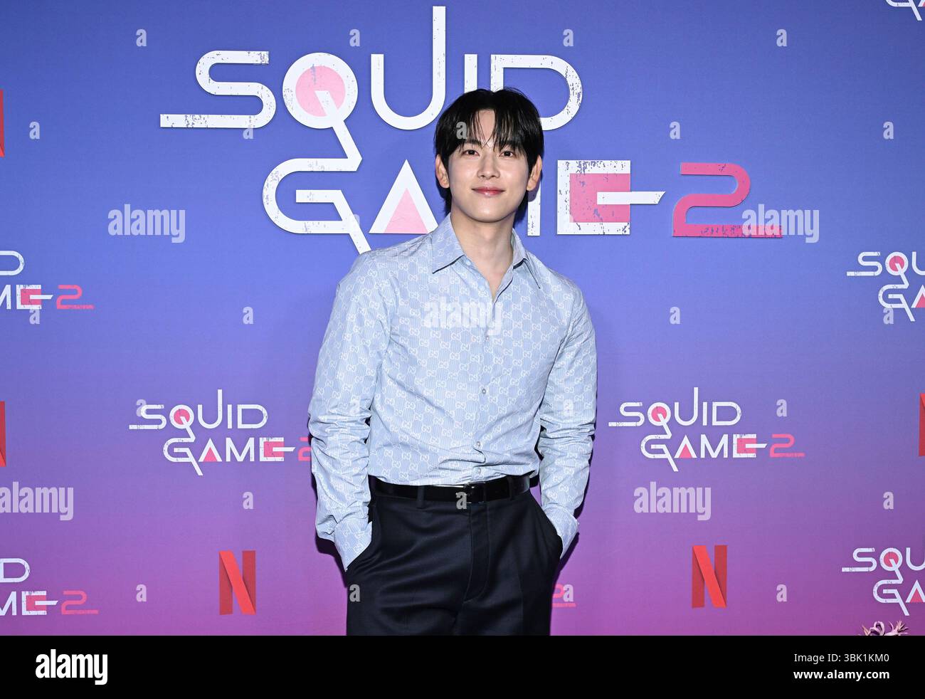 Yim Si-wan poses at a Netflix "Squid Game" cast photo call at the Squid