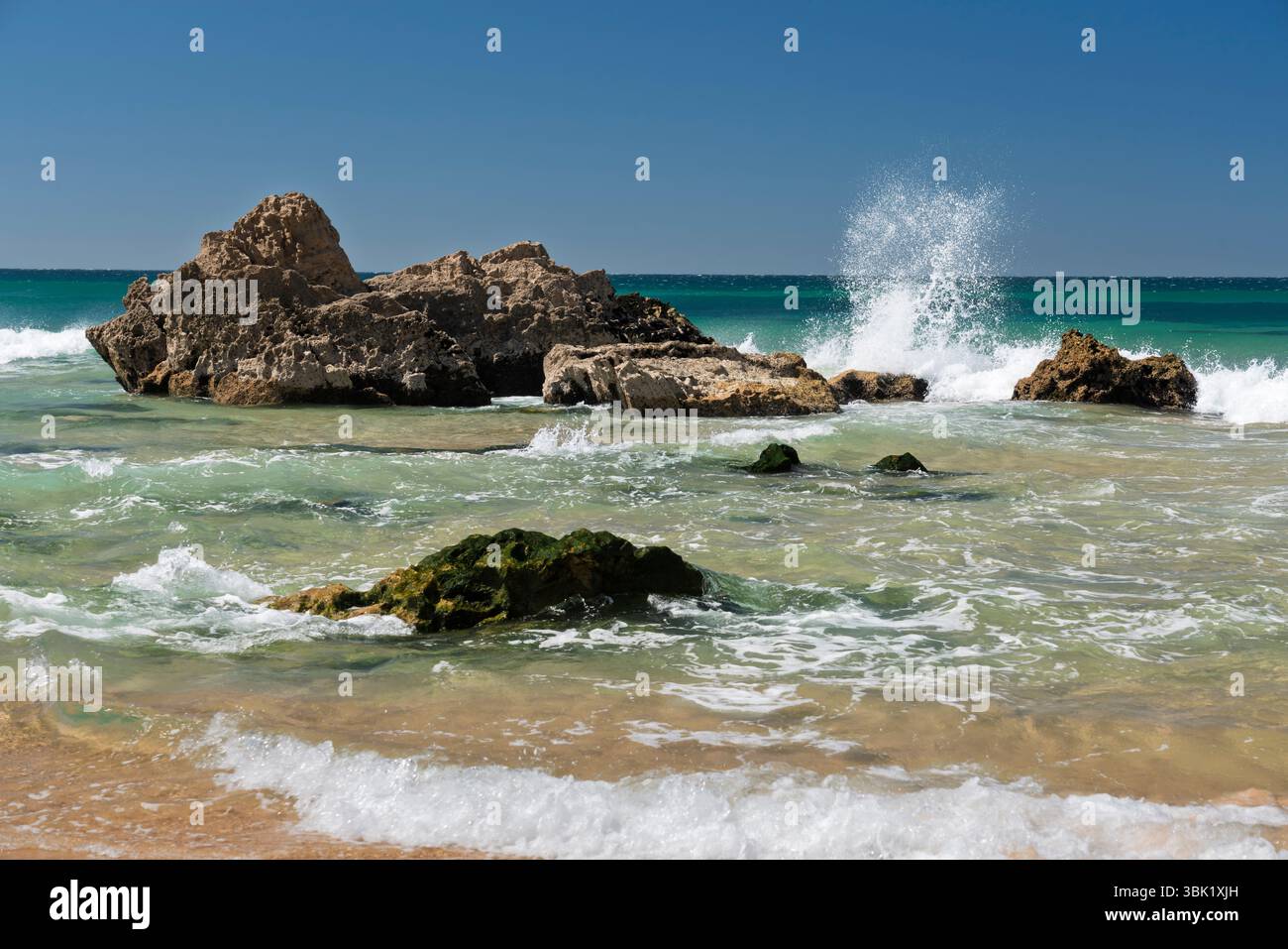 Off Shore Rocks Offshore rocks, sea stacks and surf on Tonel Beach, Sagres, Algarve ...
