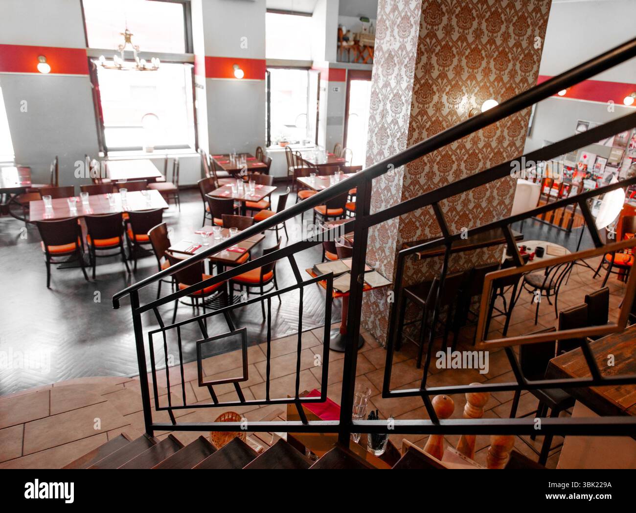 Interior of a traditional hungarian restaurant with tables and chair ...