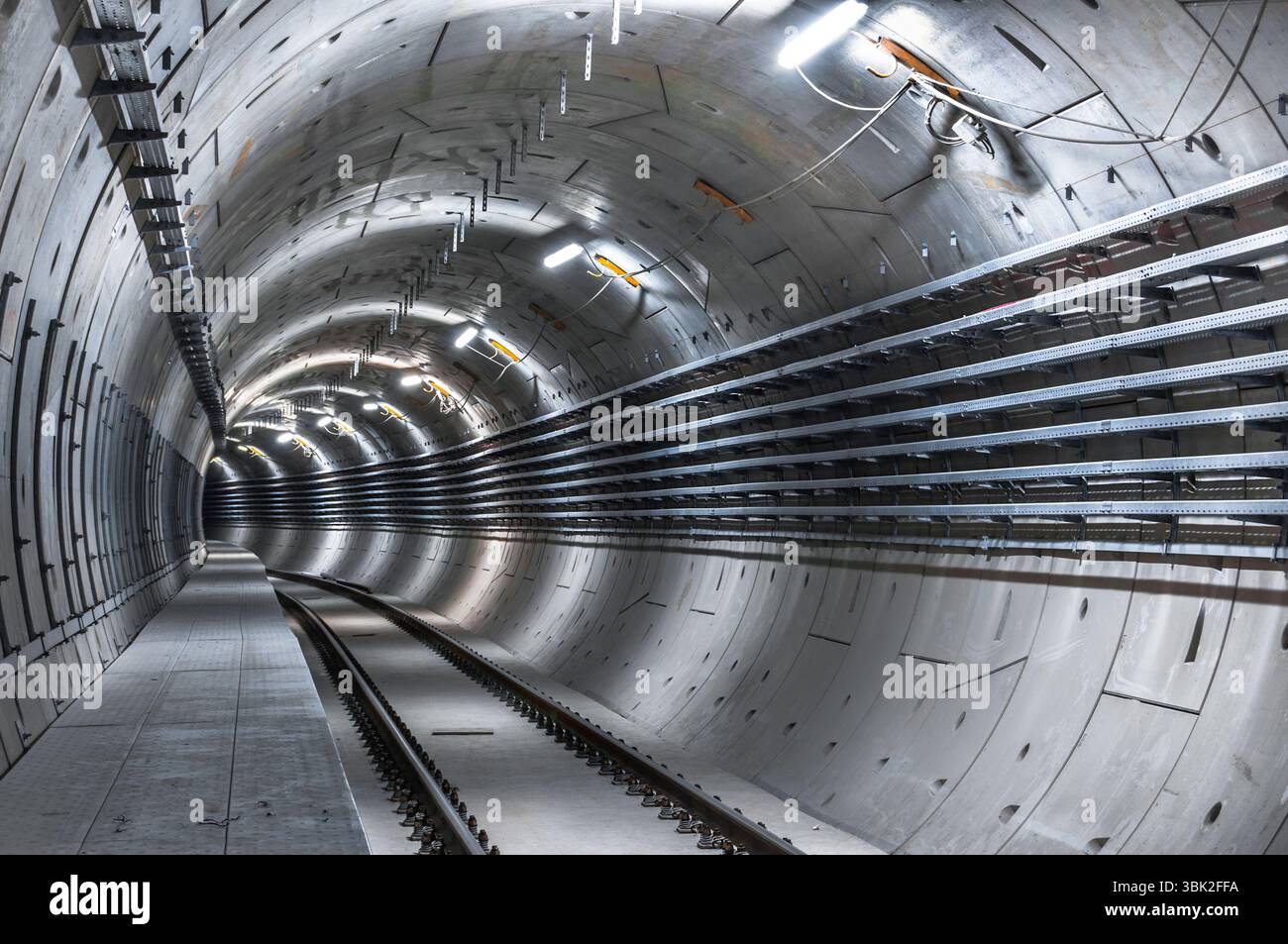 Large Underground Structure Underground facility with a big tunnel leading deep down Stock Photo ...