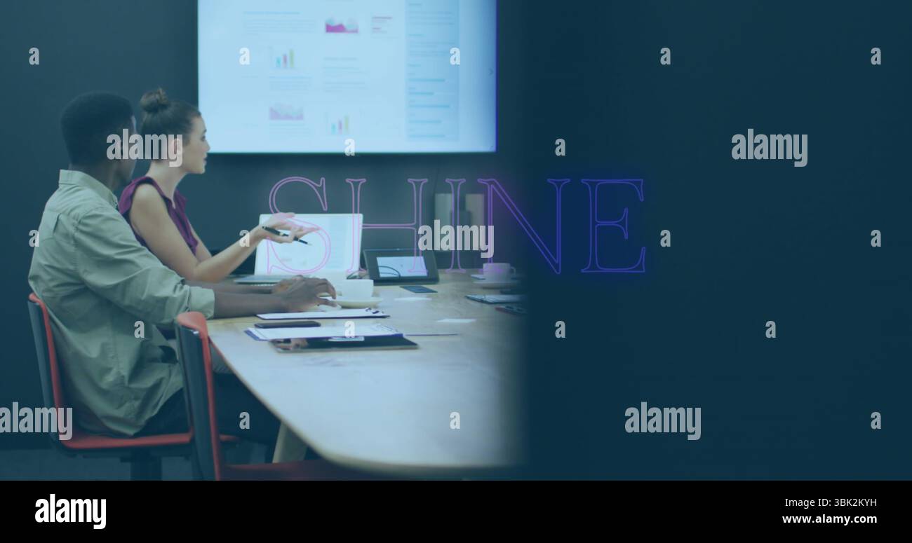 Analyzing graphs professionals gesturing at laptop, tablet, documents in meeting room, copy space Stock Photo