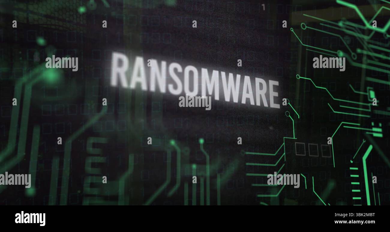 Displaying central white uppercase RANSOMWARE text on green circuit interface, with binary code Stock Photo