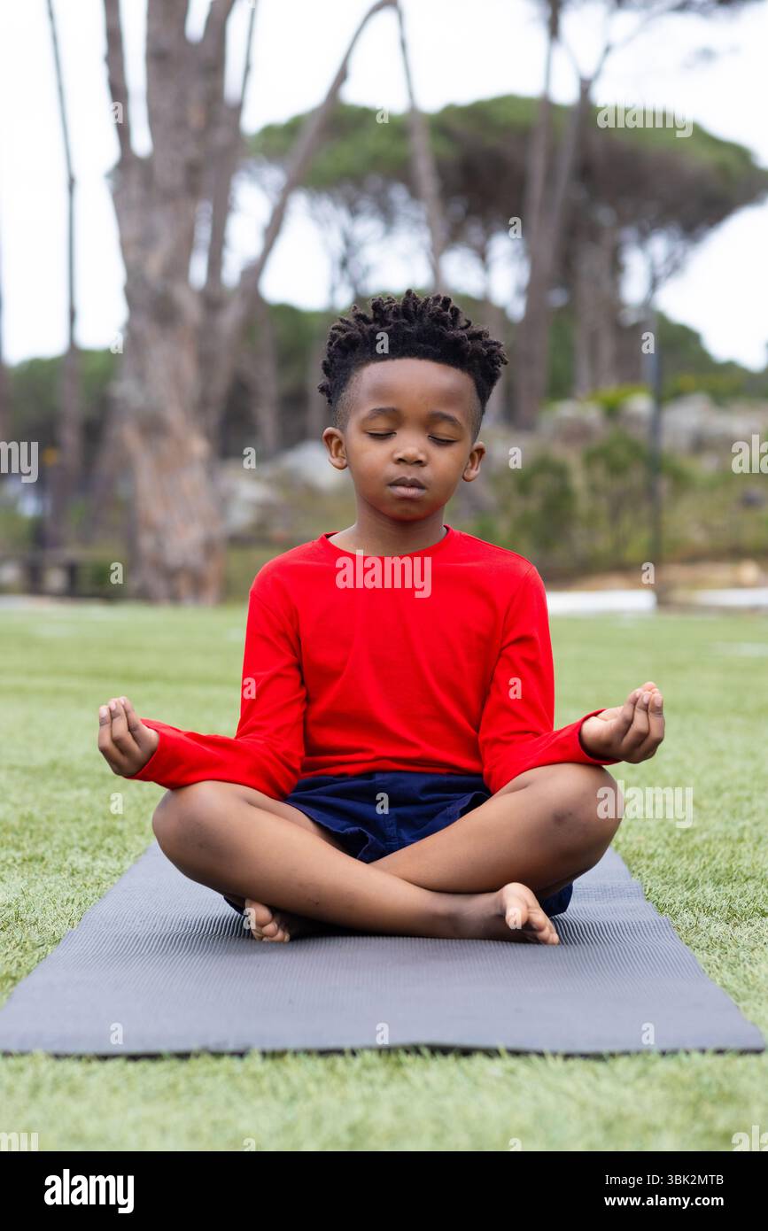 African american boy meditating hi-res stock photography and images - Alamy