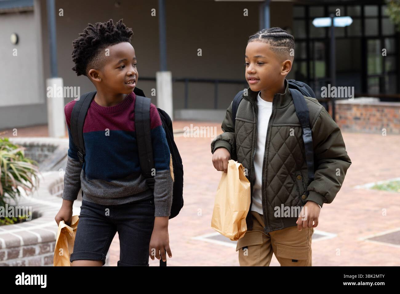 Two boys talking on school hi-res stock photography and images - Alamy