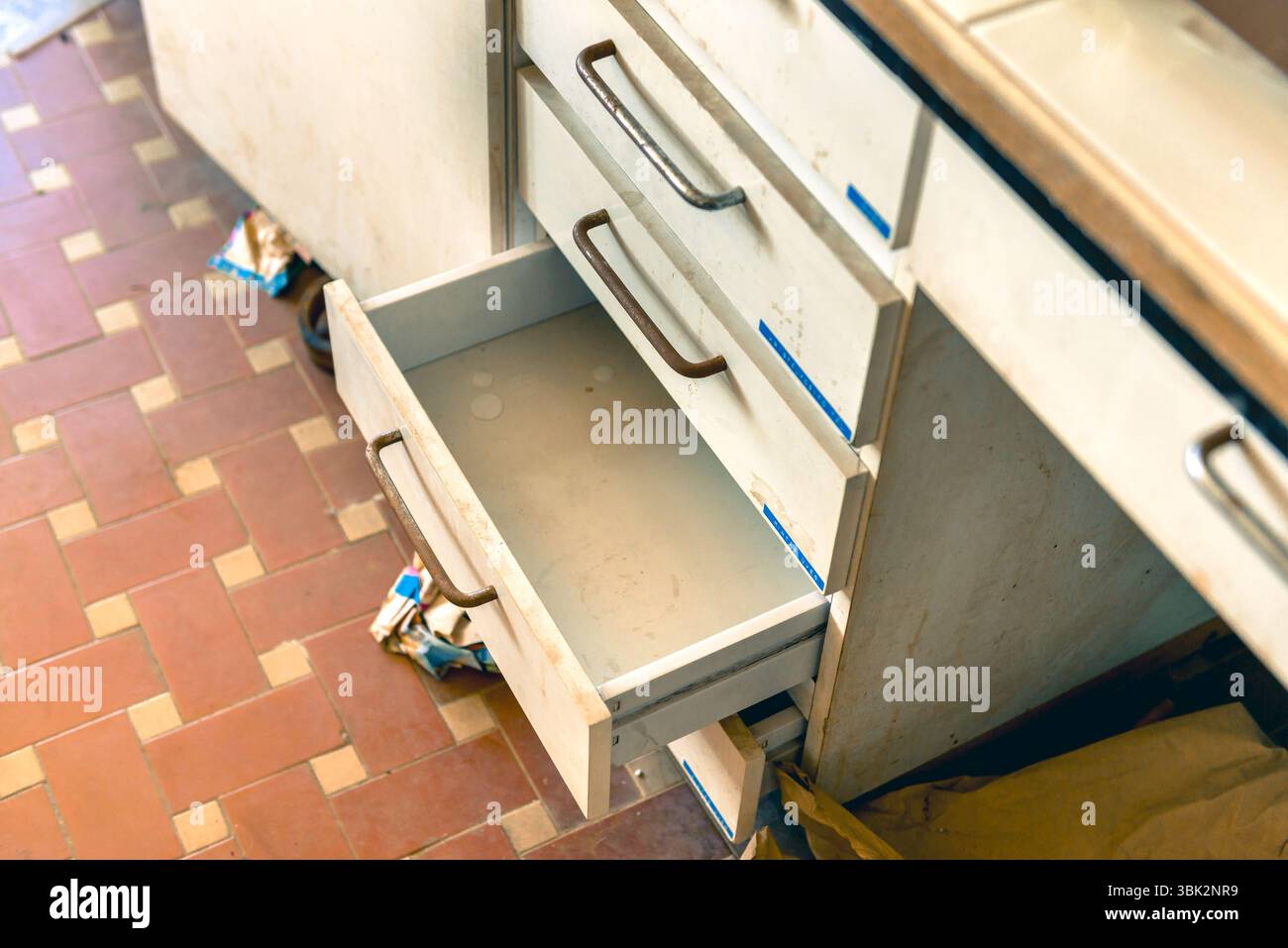 Cupboard with opened empty drawer closeup photo Stock Photo