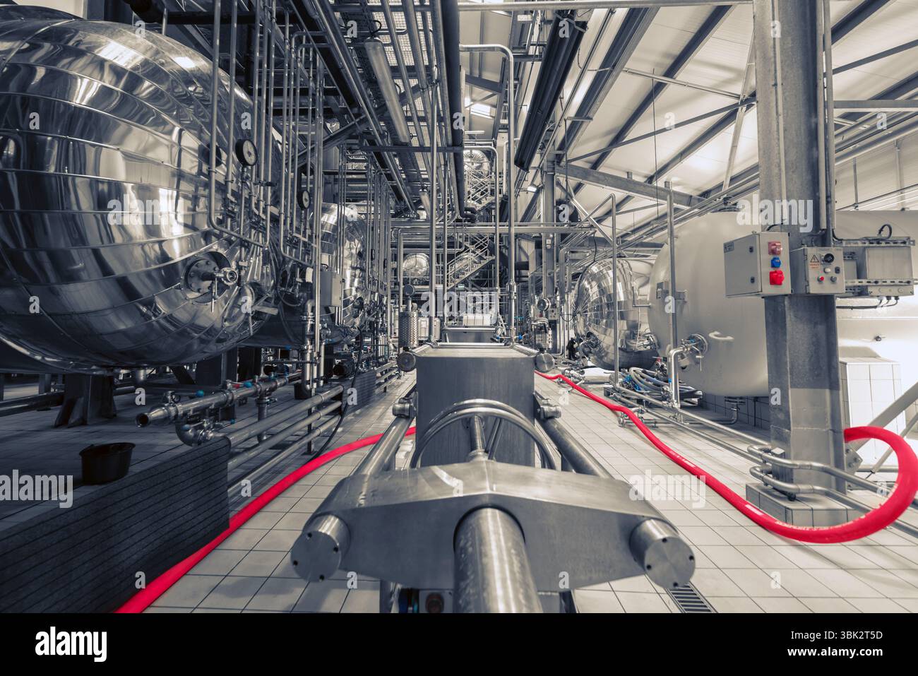 Industrial interior of an alcohol factory with silos Stock Photo - Alamy