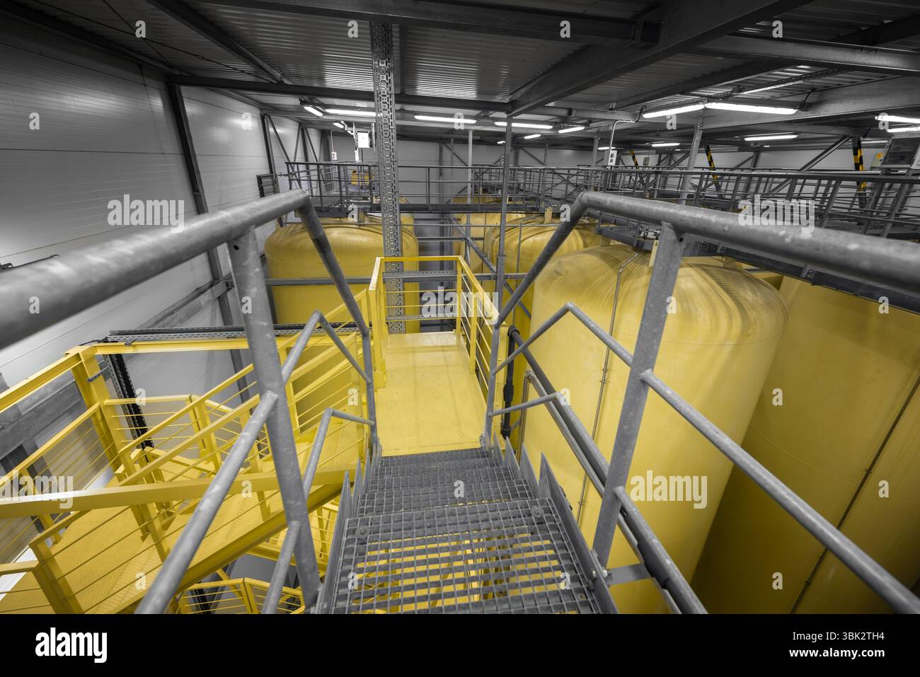 Industrial interior with welded silos from above Stock Photo - Alamy