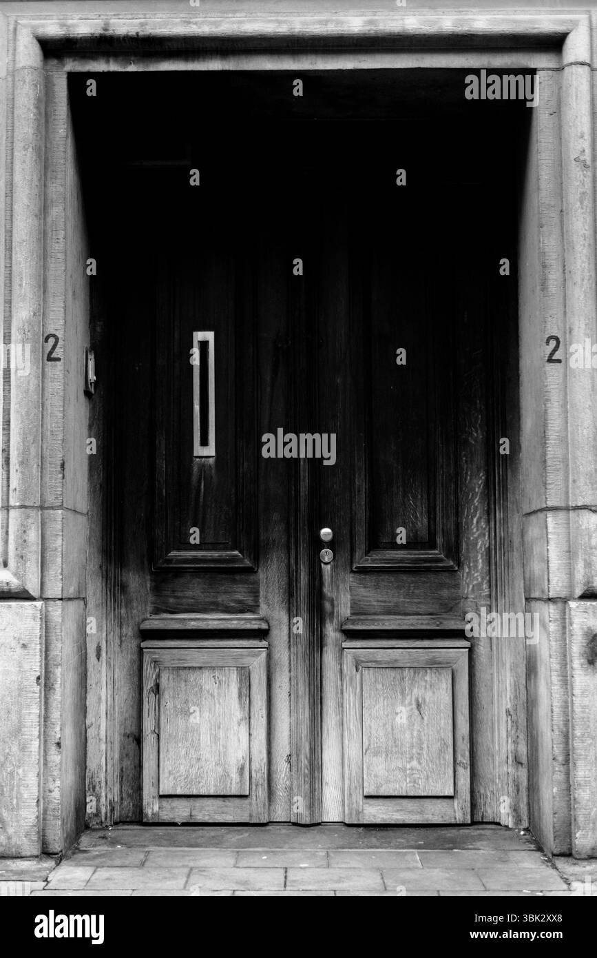 Open entrance wooden door Black and White Stock Photos & Images - Alamy