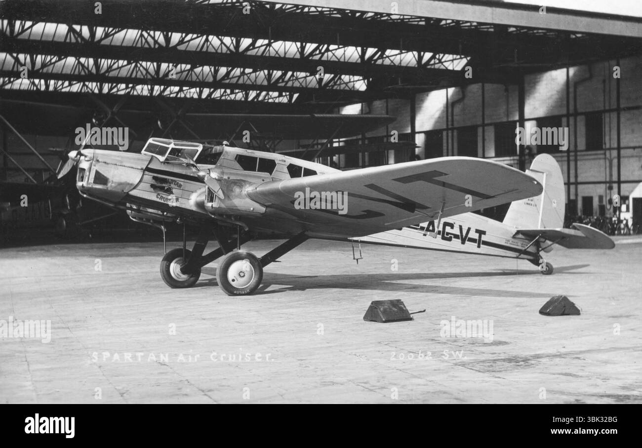 London. c.1934 - A photograph of a Spartan Cruiser II three-engine passenger monoplane, registration G-ACVT, of Spartan Air Lines Ltd. This aircraft, named ‘Middlesex’, is shown parked within a hangar. Spartan Air Lines Ltd was a British private airline company founded in February 1933 as a subsidiary of Spartan Aircraft Ltd. In September  1935, it merged with United Airways Ltd to form British Airways Ltd. On 25 July 1936, the aircraft depicted was destroyed on the Isle of Skye after crashing through a boundary wall on landing. Stock Photo
