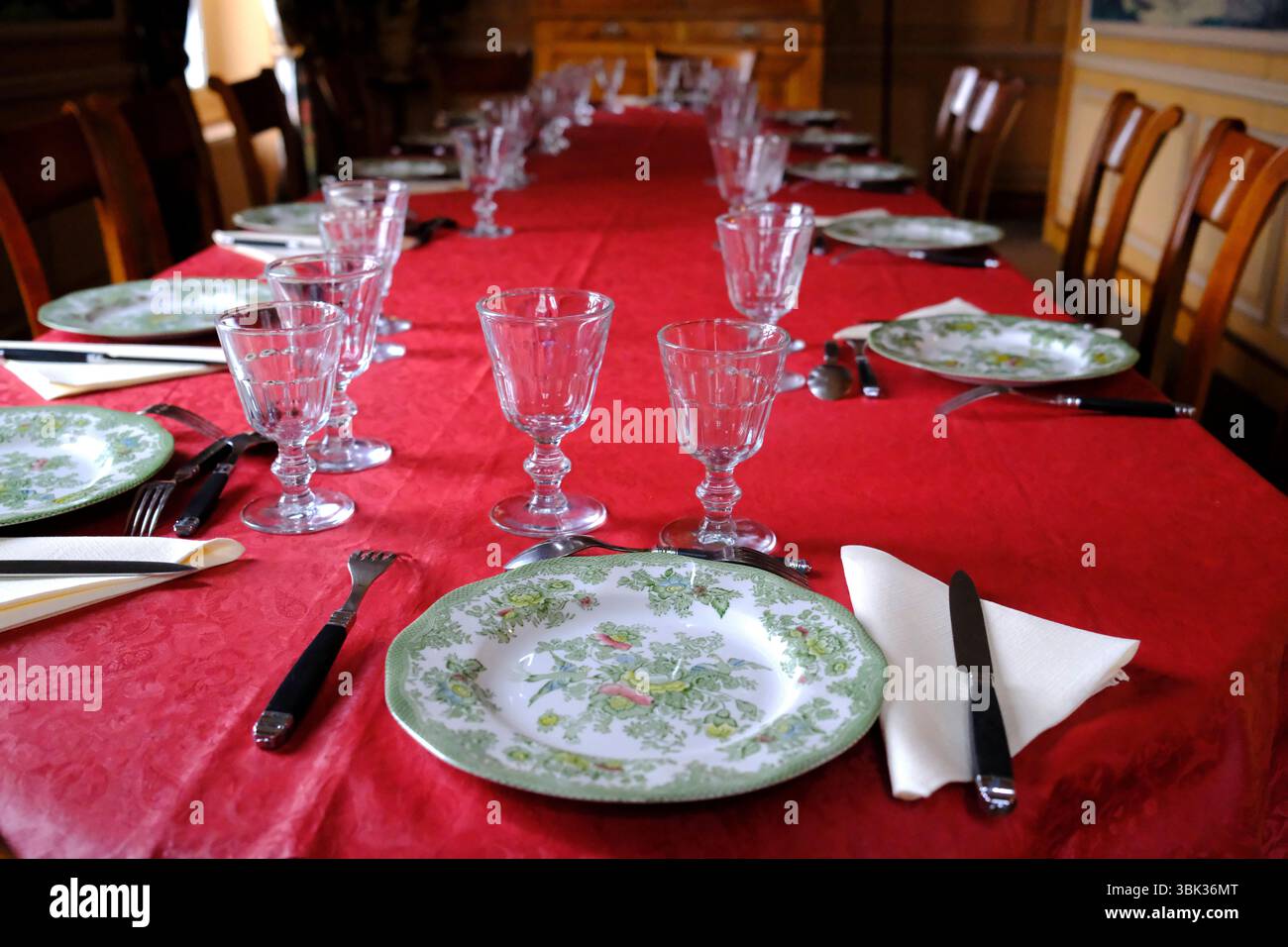able set for lunch in a dining room. Stock Photo