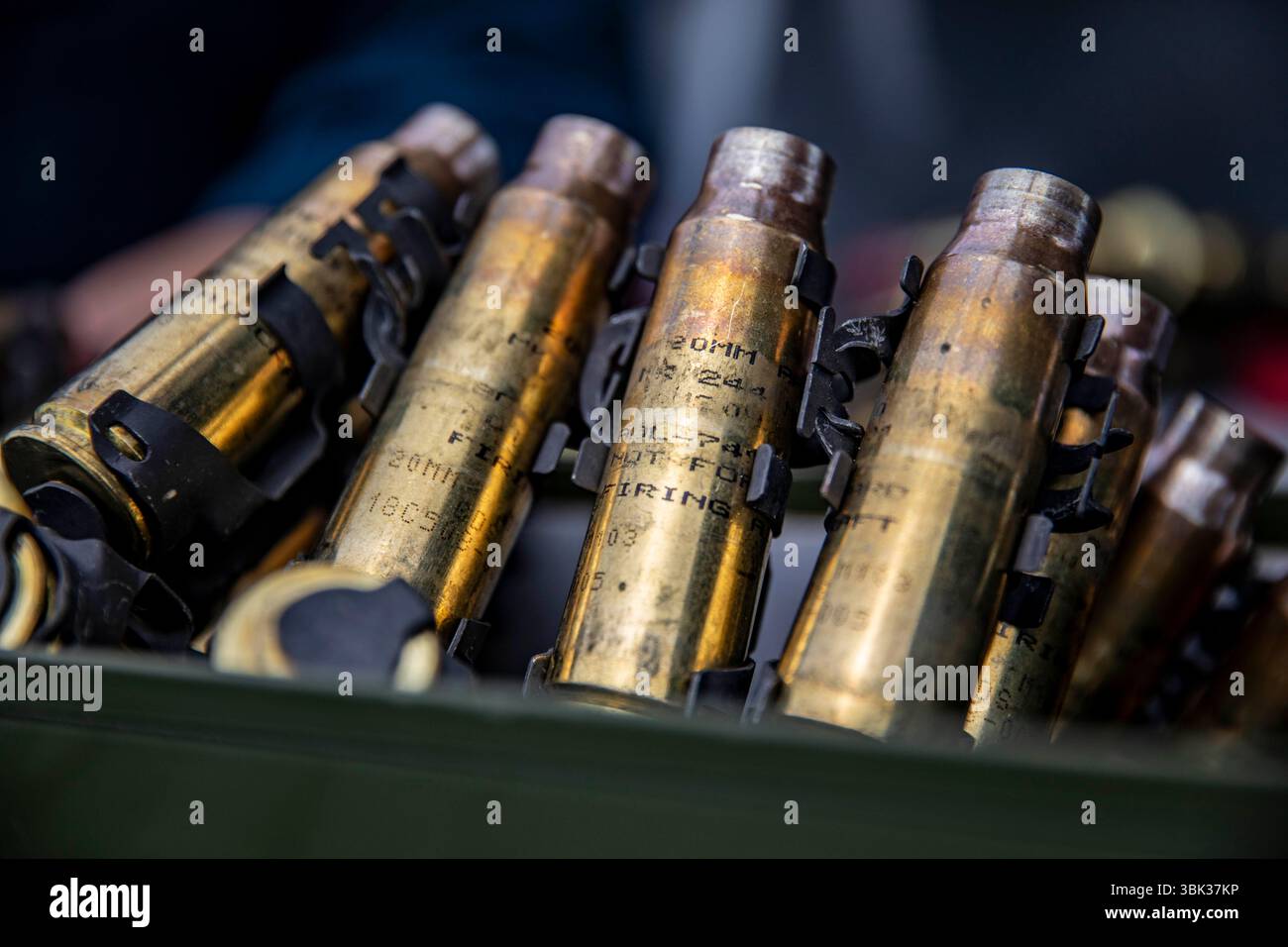 Spent ammunition shells from the close-in weapon system (CIWS) live ...