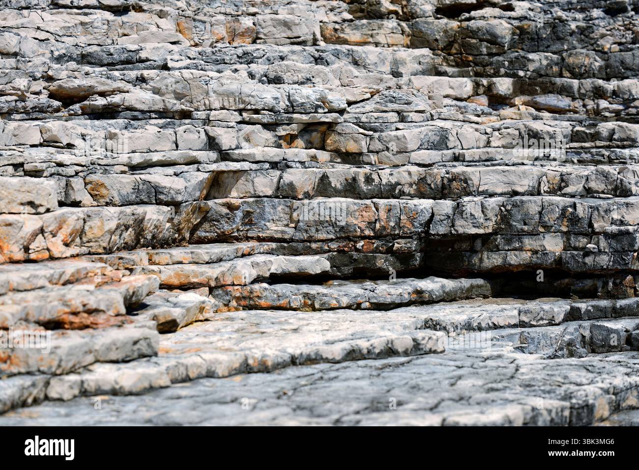 Aged rock texture background closeup with moss Stock Photo - Alamy