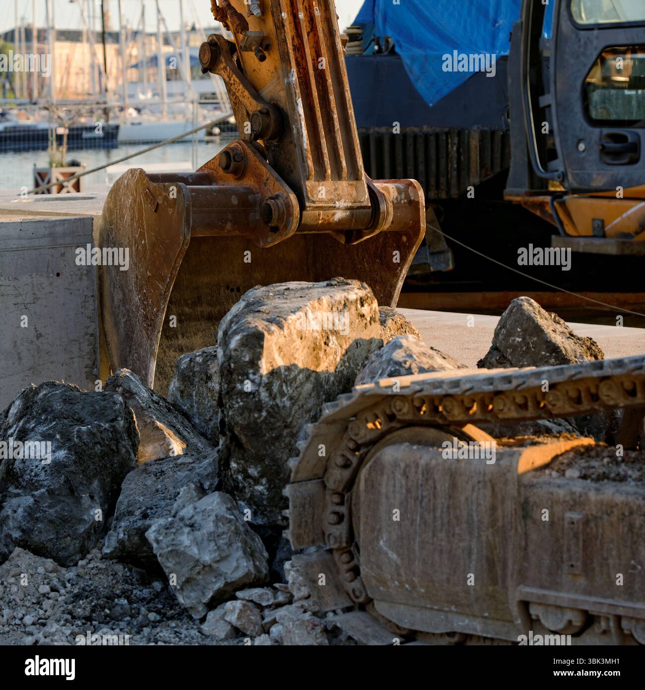 Large industrial interior with orange bulldozer inside Stock Photo