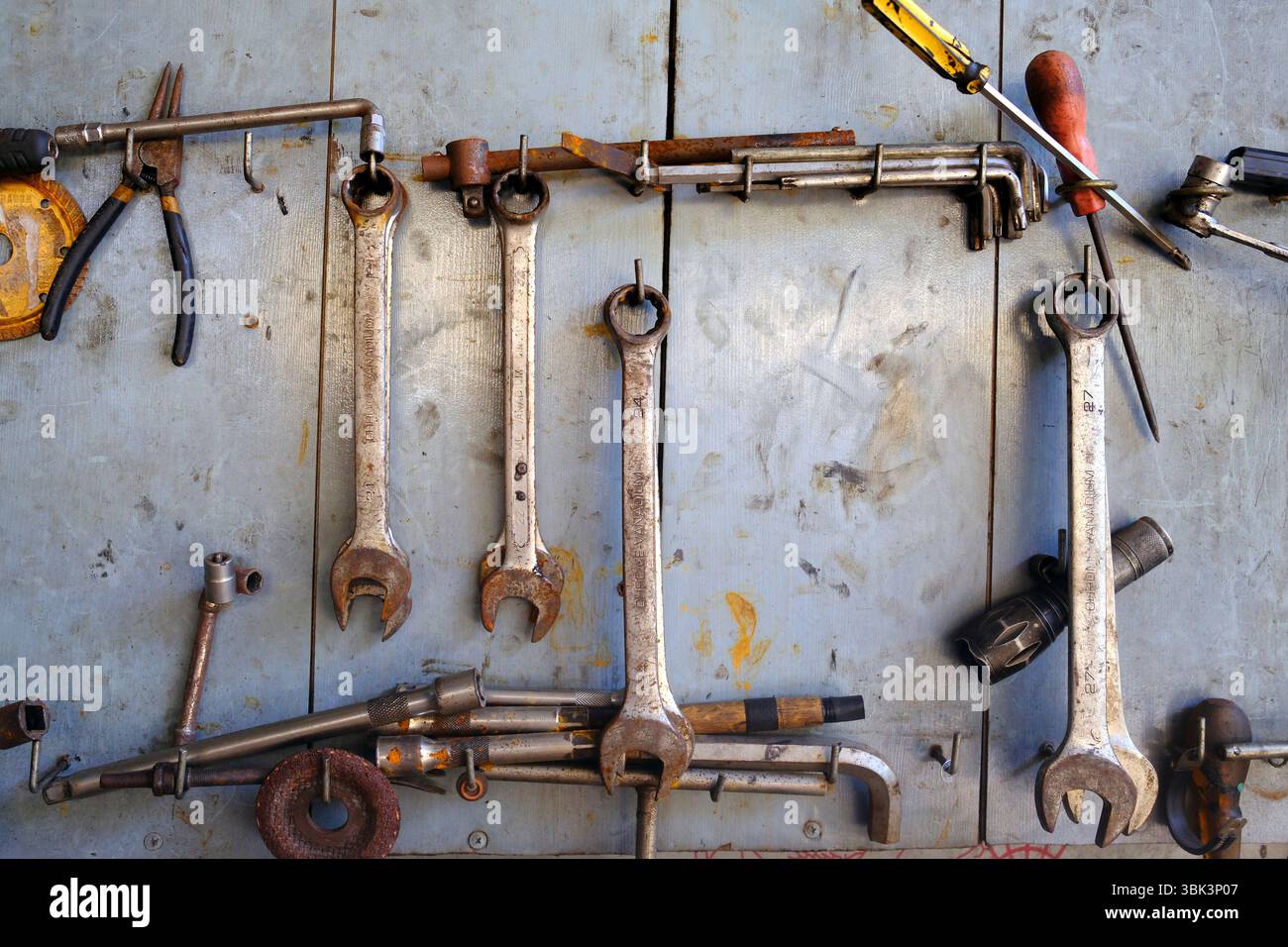 Old tools in a garage. Car repair. Kontum. Vietnam. Stock Photo