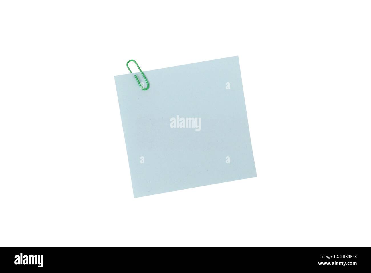 Adhesive notes or Sticky notes, A single green paperclip secures a blank light blue square note, isolated on a white background include clipping path Stock Photo