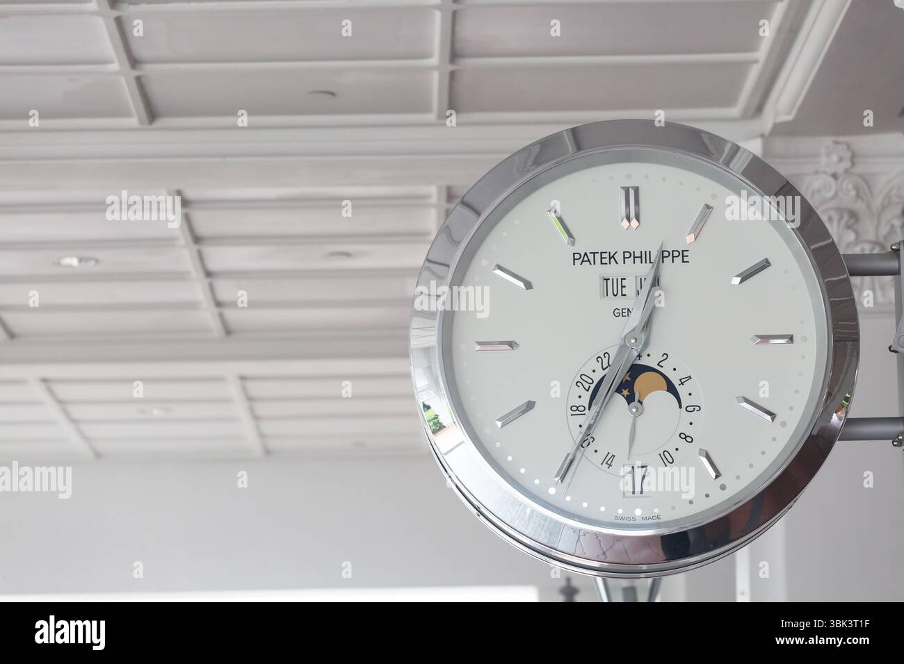 Patek Philippe shiny clock showing afternoon time, 12.35pm.Fix at high ...