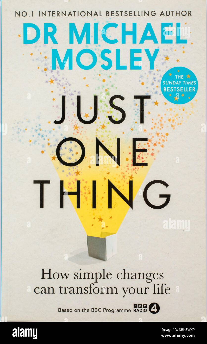 The front book cover of Just One Thing (How simple changes can transform your life) by author Dr Michael Mosley. A non fiction paperback. Stock Photo