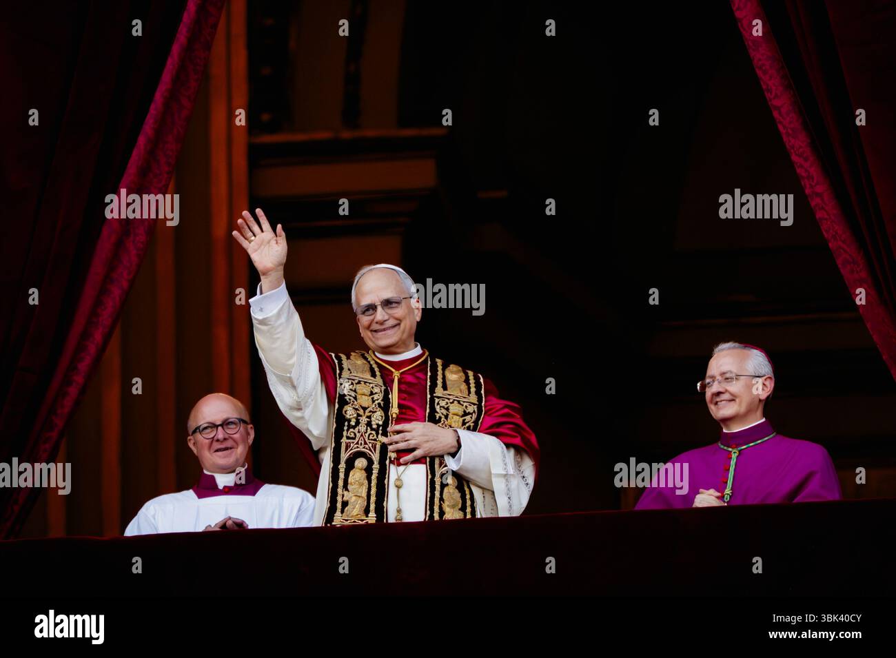 Newly elected Pope Leo XIV, Robert Prevost arrives on the main central loggia balcony of the St Peter's Basilica for the first time, after the cardina Stock Photo