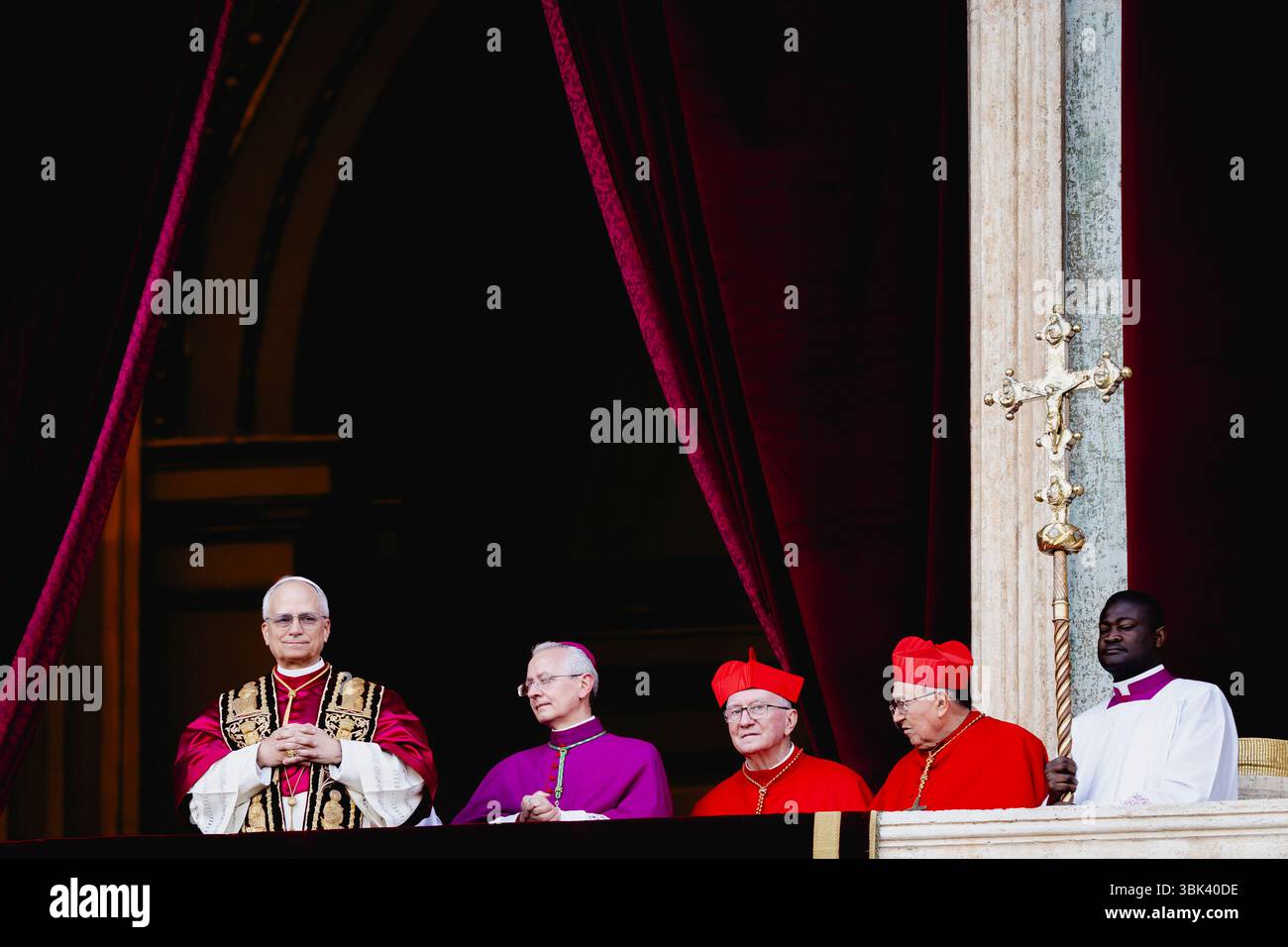 Newly elected Pope Leo XIV, Robert Prevost arrives on the main central loggia balcony of the St Peter's Basilica for the first time, after the cardina Stock Photo
