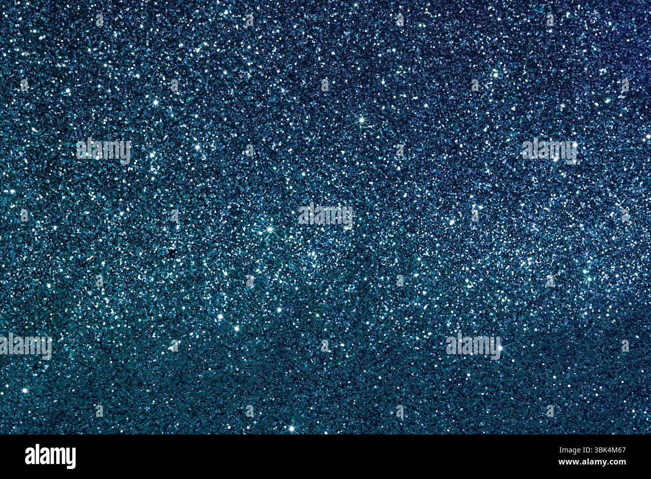 Blue, from blue to dark emerald shiny background with sparkles, small sequins. Empty background for your design. Stock Photo