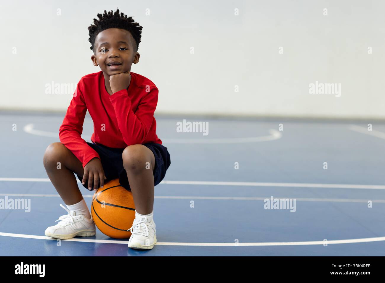 African boy red shirt smiling hi-res stock photography and images - Alamy
