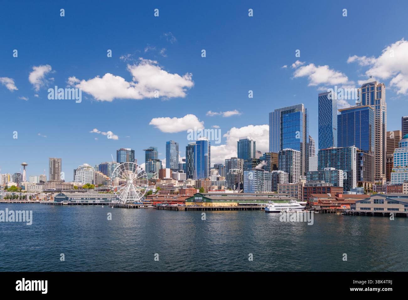 Bright and sunny panoramic view of Seattle skyline from the water ...