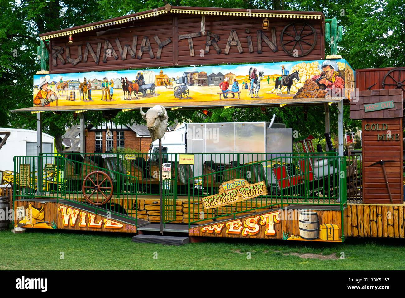 The Runaway Train ride, a Wild West themed attraction at a funfair in Saffron Walden, Essex, UK Stock Photo