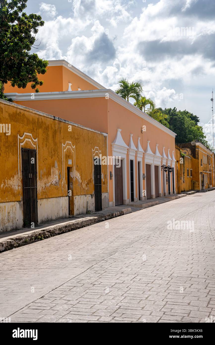 Yellow facade colonial building with arched galleries and traditional ...