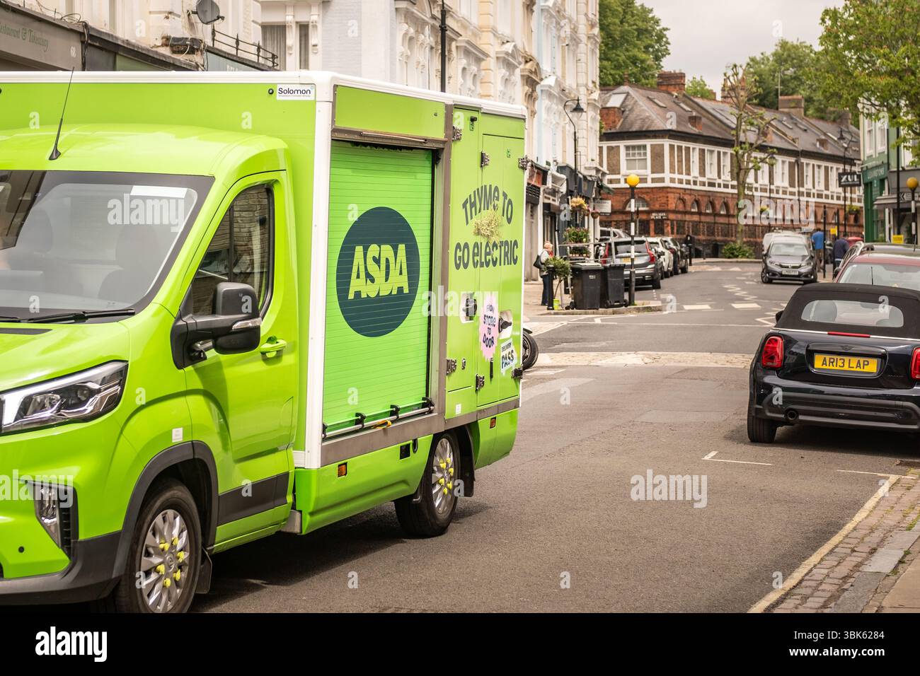 LONDON- MAY 22, 2025: Asda delivery van. Home delivery service for Asda's online supermarket shopping service Stock Photo