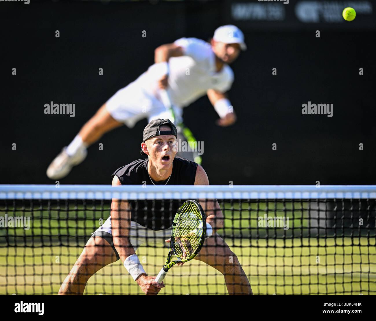 18th June 2025; Lexus Nottingham Tennis Centre, Nottingham, England; Lexus Nottingham Open, Day 3; Cleeve Harper (CAN) watches the serve from his partner Eliot Spizzirri (USA) in the second round match against Santiago Gonzalez (MEX) and Austin Krajicec (USA) Credit: Action Plus Sports Images/Alamy Live News Stock Photo