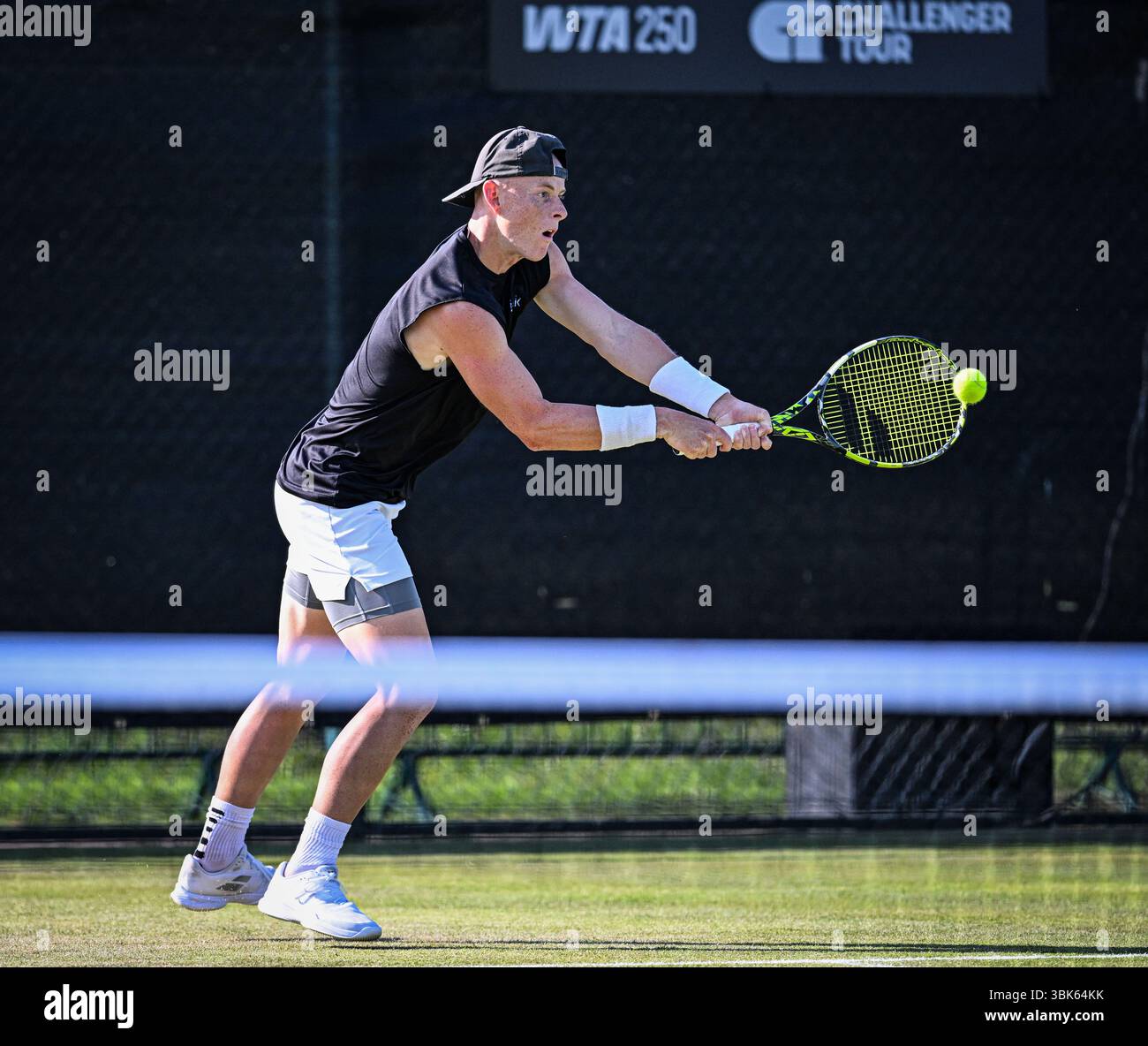 18th June 2025; Lexus Nottingham Tennis Centre, Nottingham, England; Lexus Nottingham Open, Day 3; Cleeve Harper (CAN) hits a backhand return in the second round match with his partner Eliot Spizzirri (USA) against Santiago Gonzalez (MEX) and Austin Krajicec (USA) Credit: Action Plus Sports Images/Alamy Live News Stock Photo