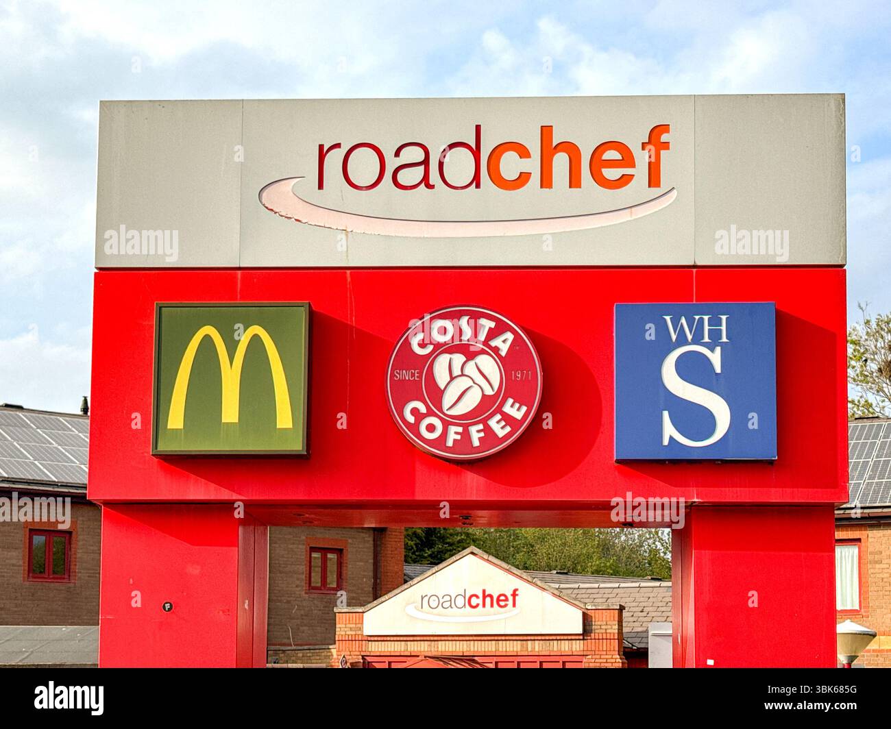 Magor, Newport, Wales, UK - 25 April 2025: Sign at the entrance to the  M4 service station at Magor advertising, McDonalds, WH Smith and Costa Coffee - Smartphone Captured Stock Image