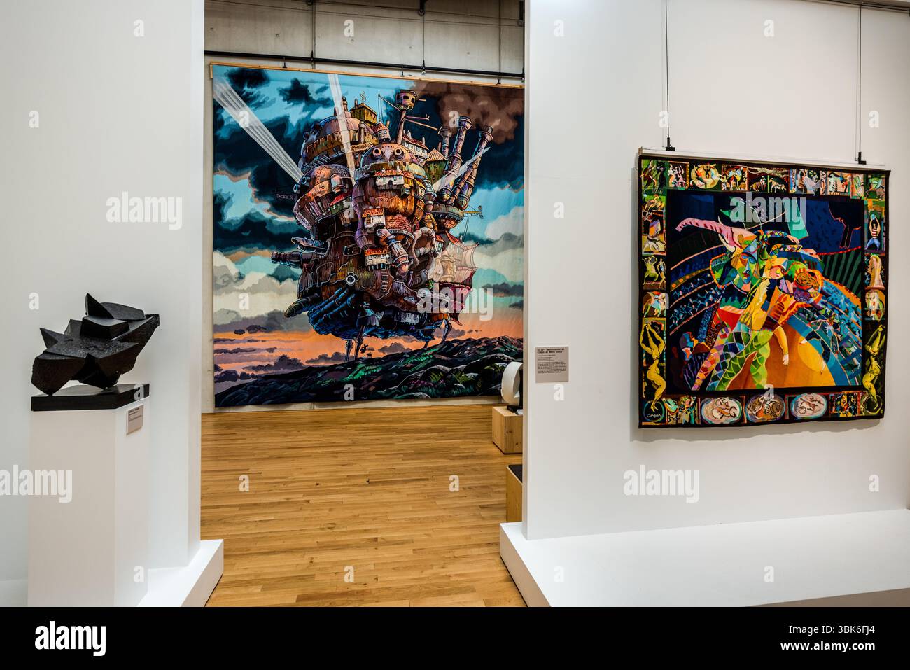 Woven adventures in the exhibition rooms of the Cité internationale de la tapisserie Aubusson. Here, "The moving castle at sunset" from the 2004 anime film Howl's Moving Castle. Woven in Aubusson from March 2022 to February 2023. Rue Williams Dumazet, Aubusson, Nouvelle-Aquitaine, France Stock Photo