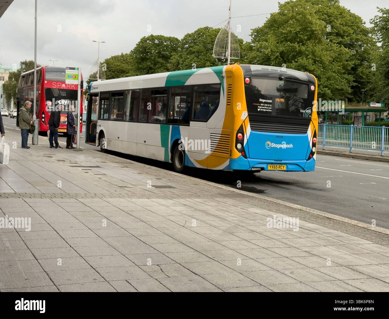 Armada  Way Plymouth Devon UK. 07.06.2025. Double and single deck buses at bus stops along Armada Way in Plymouth city centre Stock Photo