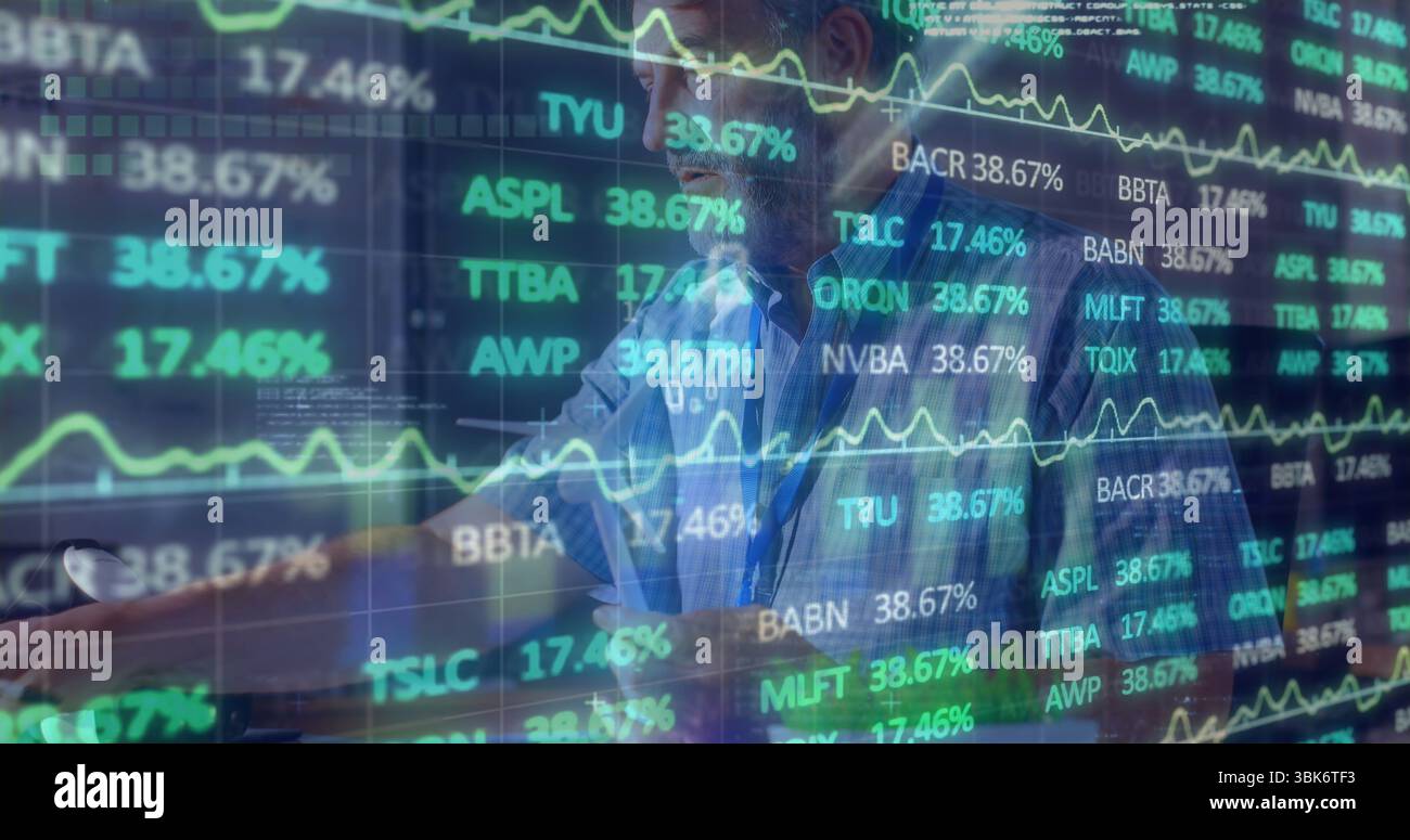 Monitoring trader wearing blue shirt, tracking stock market at office ...