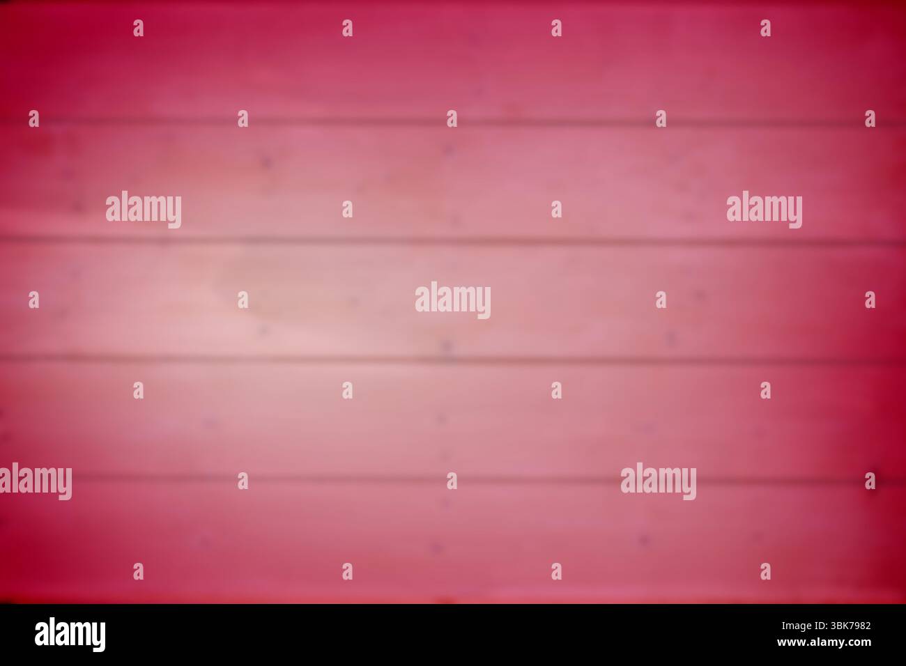 Red wooden panels are showing blurred horizontal grain with soft vignette in flat design Stock Photo