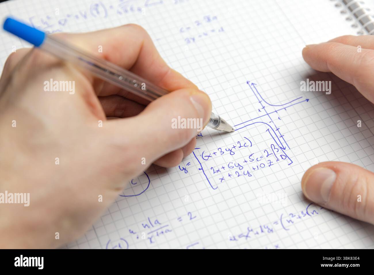 Math Writng Writing math exercise close up photo Stock Photo - Alamy