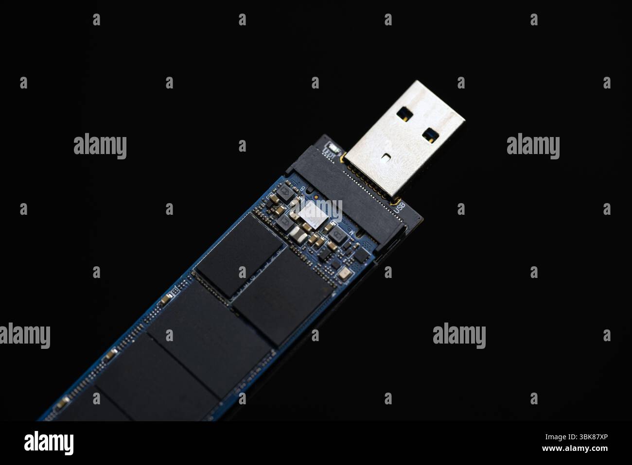 Solid state drive against dark isolated background closeup Stock Photo